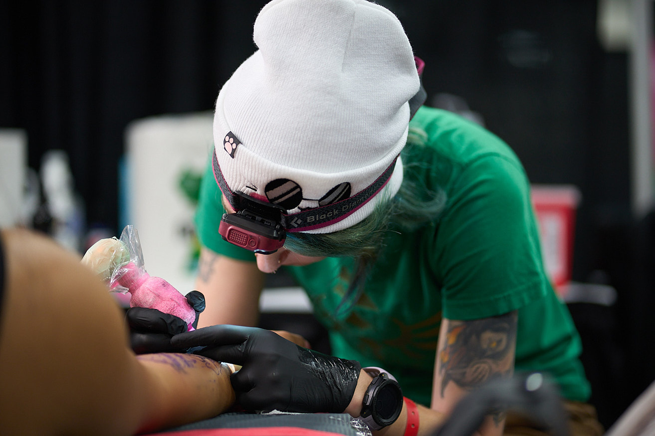 Anna Saveria tattooing at the Video Game Tattoo convention